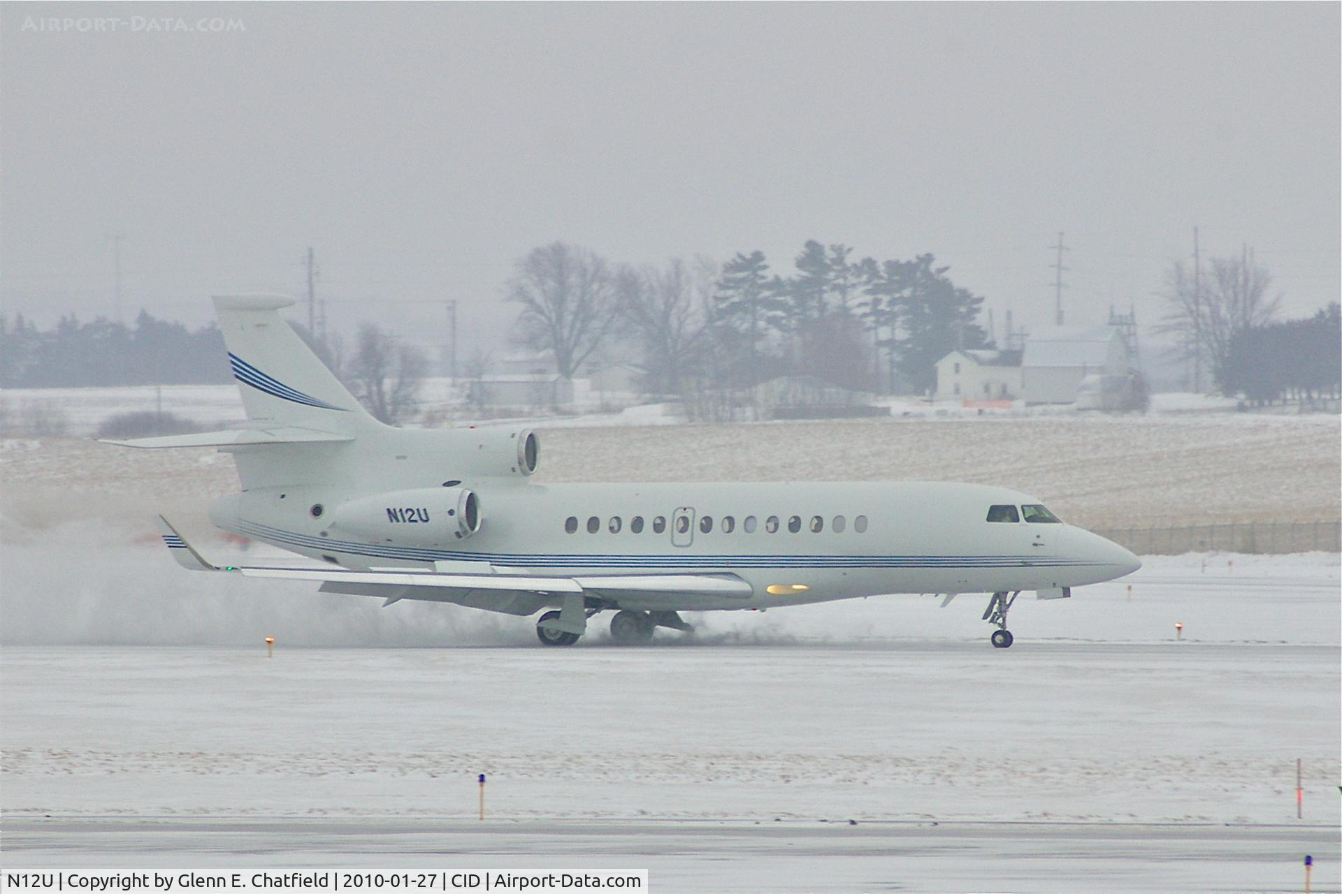 N12U, 2008 Dassault Falcon 7X C/N 53, Rolling out after landing on Runway 27 during snow shower