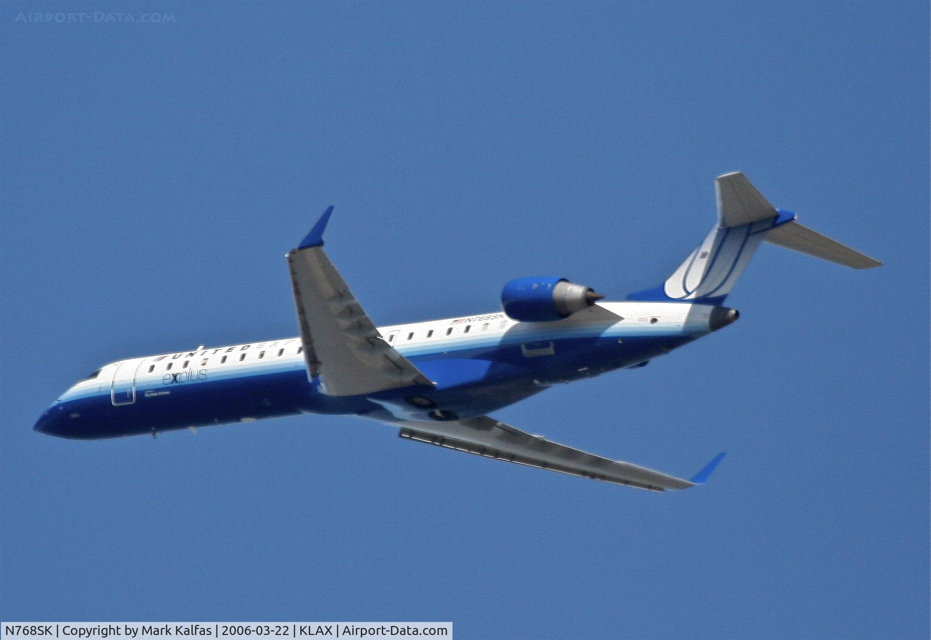 N768SK, 2005 Bombardier CRJ-701ER (CL-600-2C10) Regional Jet C/N 10234, SkyWest CL-600-2B19, 25R departure KLAX.