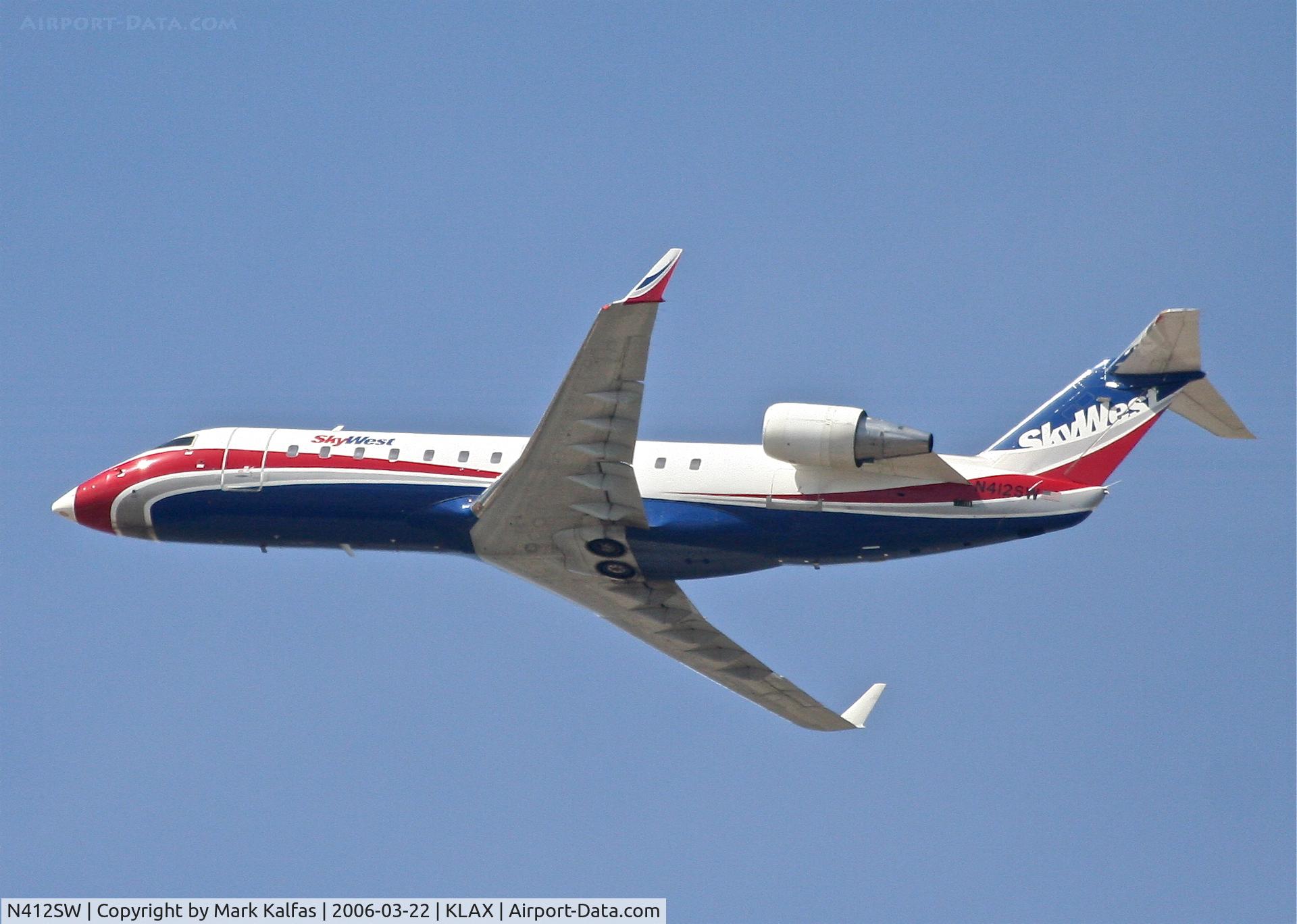 N412SW, 1995 Canadair CRJ-200ER (CL-600-2B19) C/N 7101, SkyWest CL-600-2B19, 25R departure KLAX.