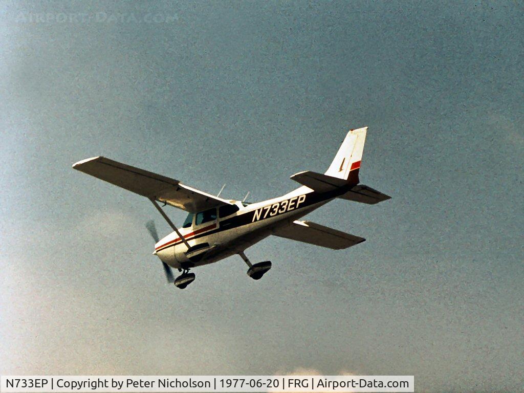 N733EP, 1976 Cessna 172N C/N 17268240, Cessna 172N Skyhawk II overflying Republic Airport, Long Island in the Summer of 1977.
