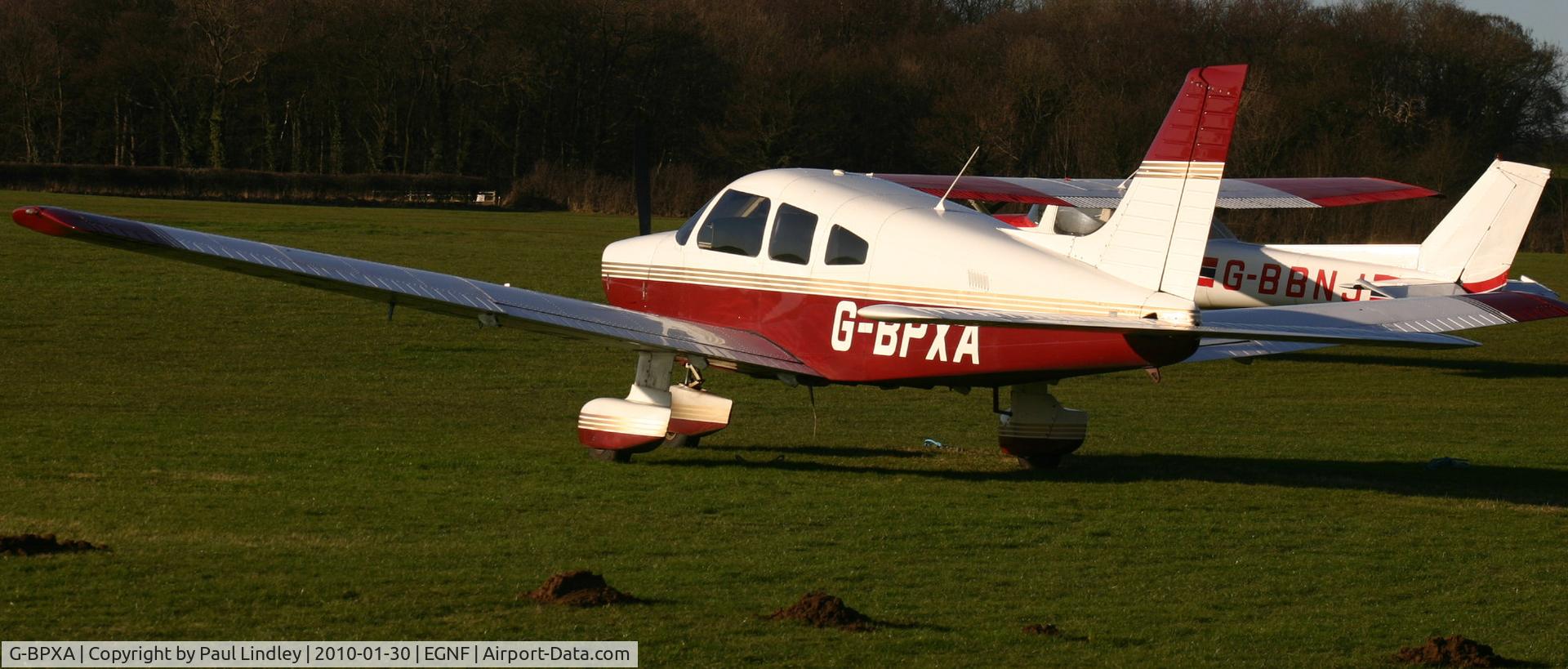 G-BPXA, 1983 Piper PA-28-181 Cherokee Archer II C/N 28-8390064, taking the Winter sun at home base