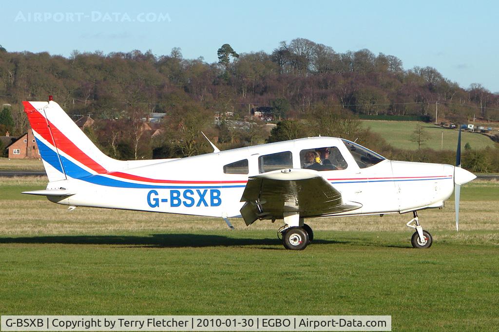 G-BSXB, 1984 Piper PA-28-161 Cherokee Warrior II C/N 28-8416125, Part of a busy aviation scene at Wolverhampton (Halfpenny Green) Airport on a crisp winters day
