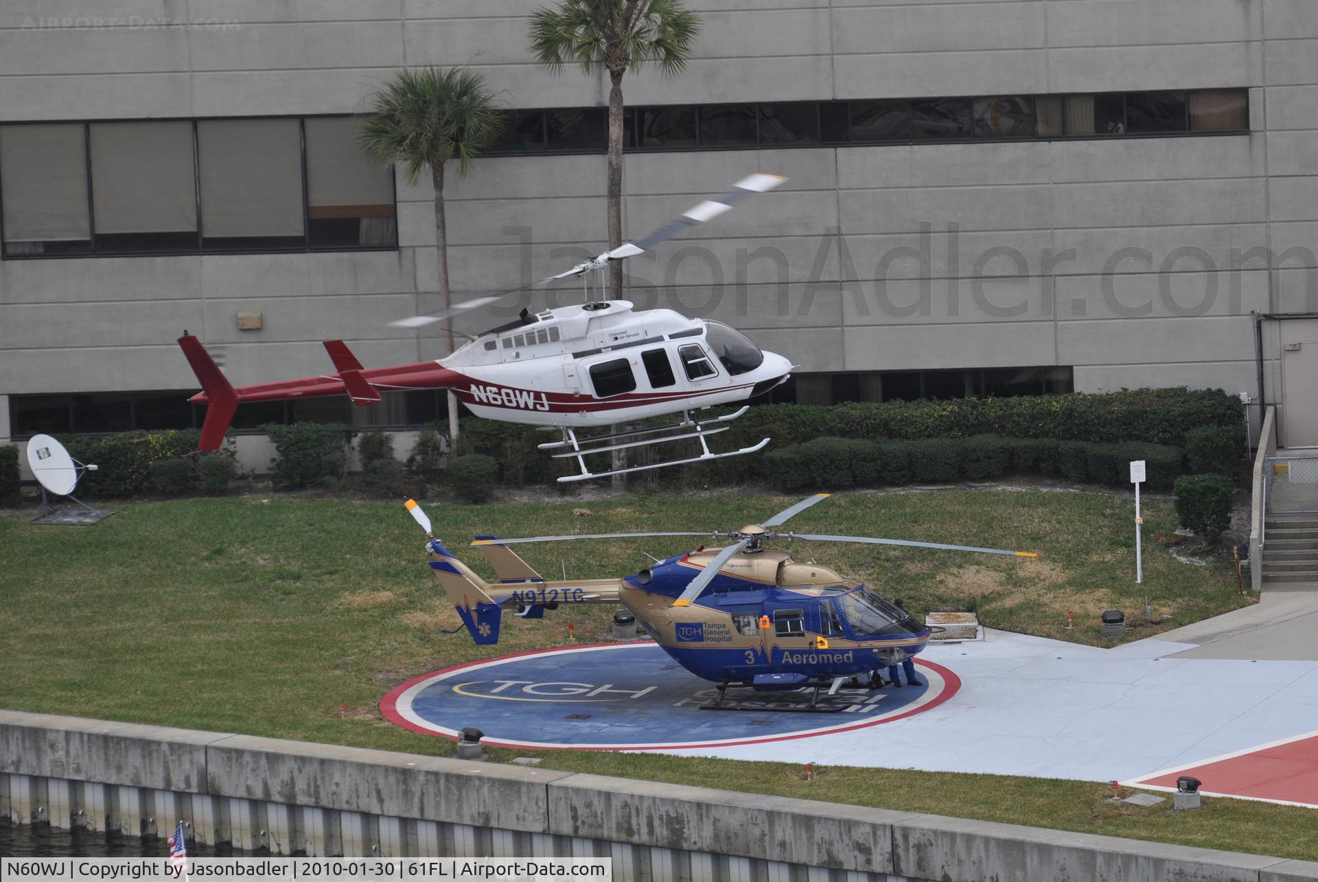 N60WJ, 1981 Bell 206L-1 LongRanger II C/N 45644, This was an organ delivery during the annual Gasparilla 2010 parade.
