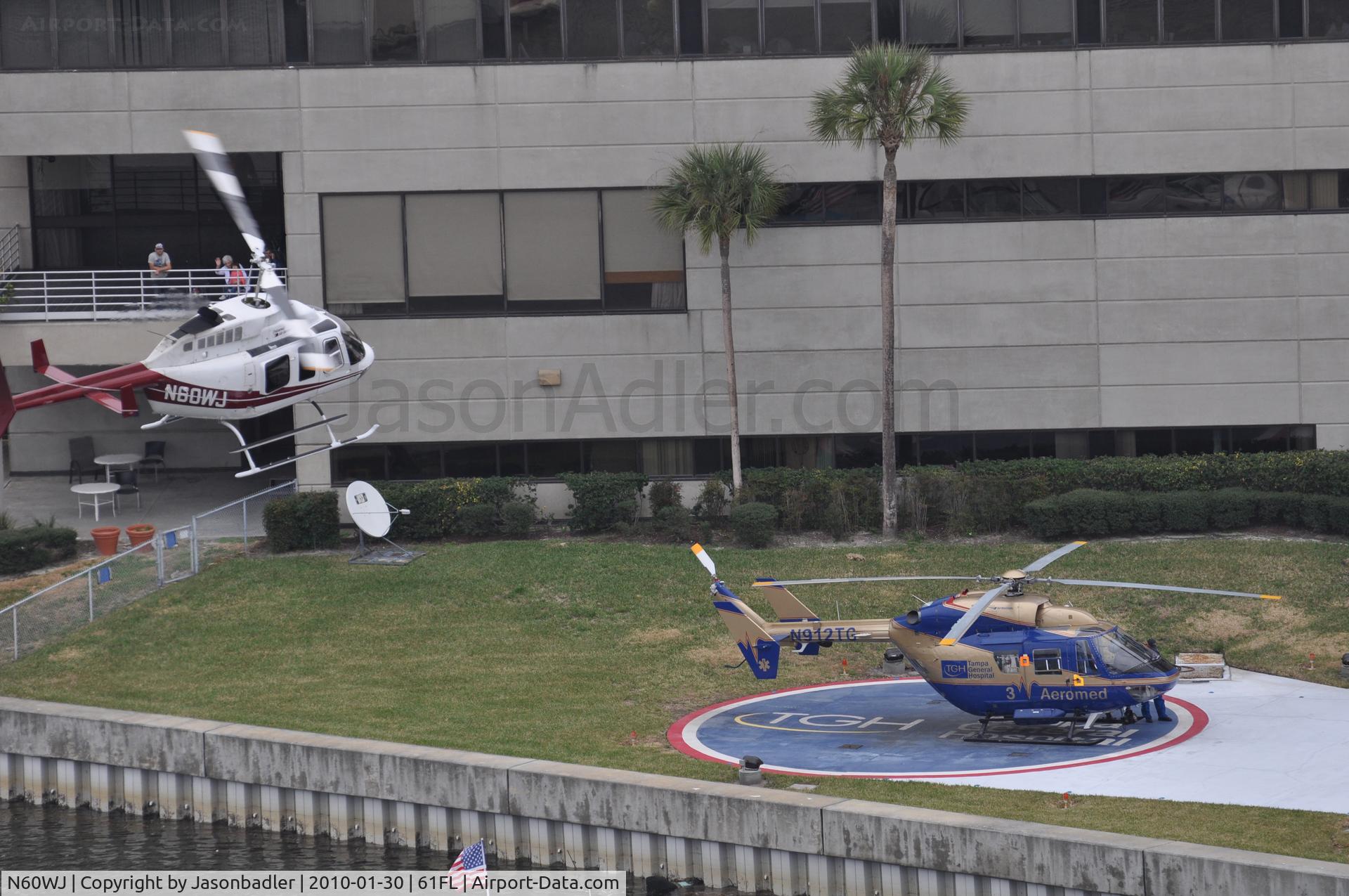 N60WJ, 1981 Bell 206L-1 LongRanger II C/N 45644, An agressive approach into Tampa General Hospital during Gasparilla 2010.