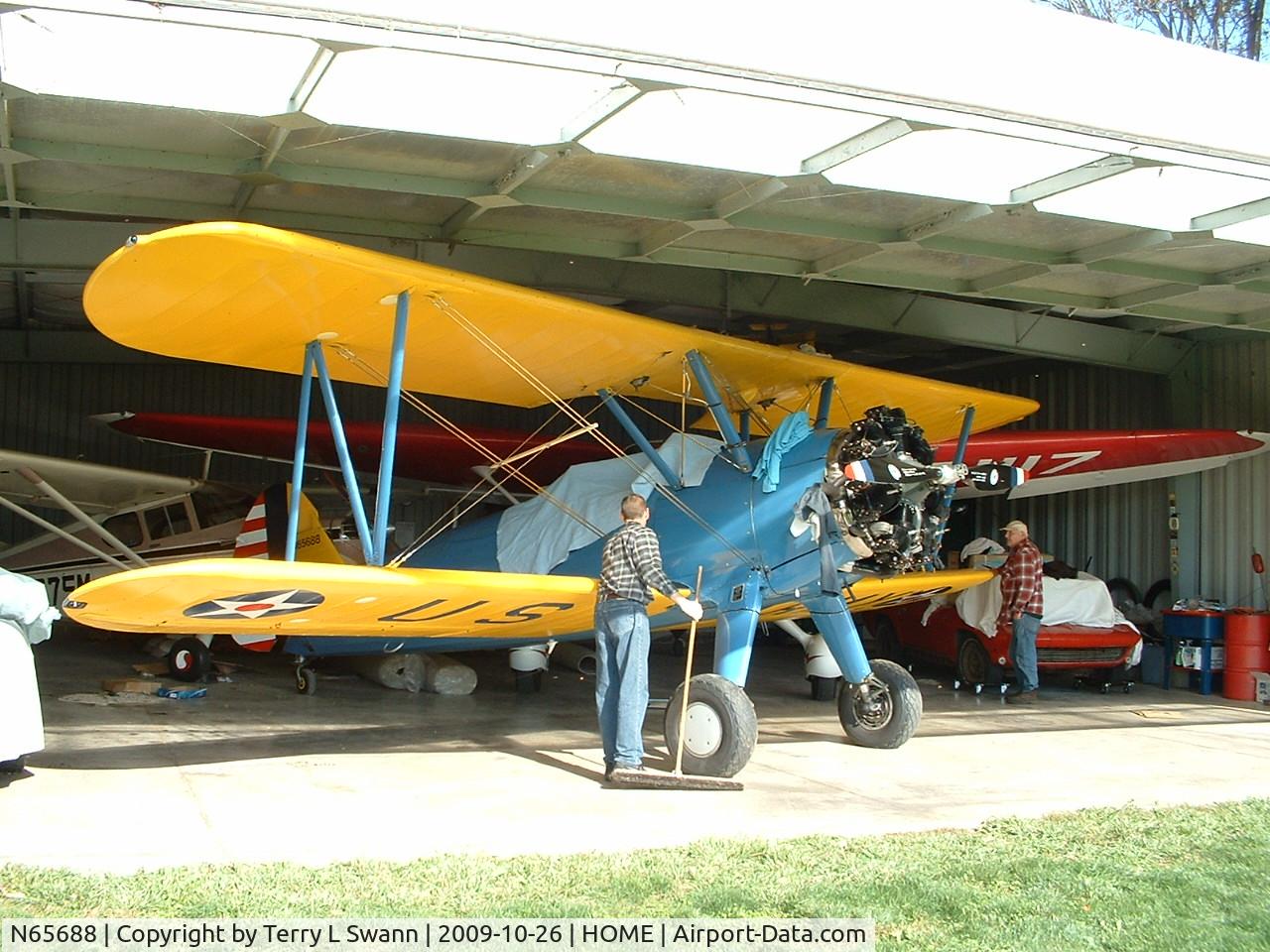 N65688, Boeing E75 C/N 75-8469, In the hanger at home with the Stinson's.