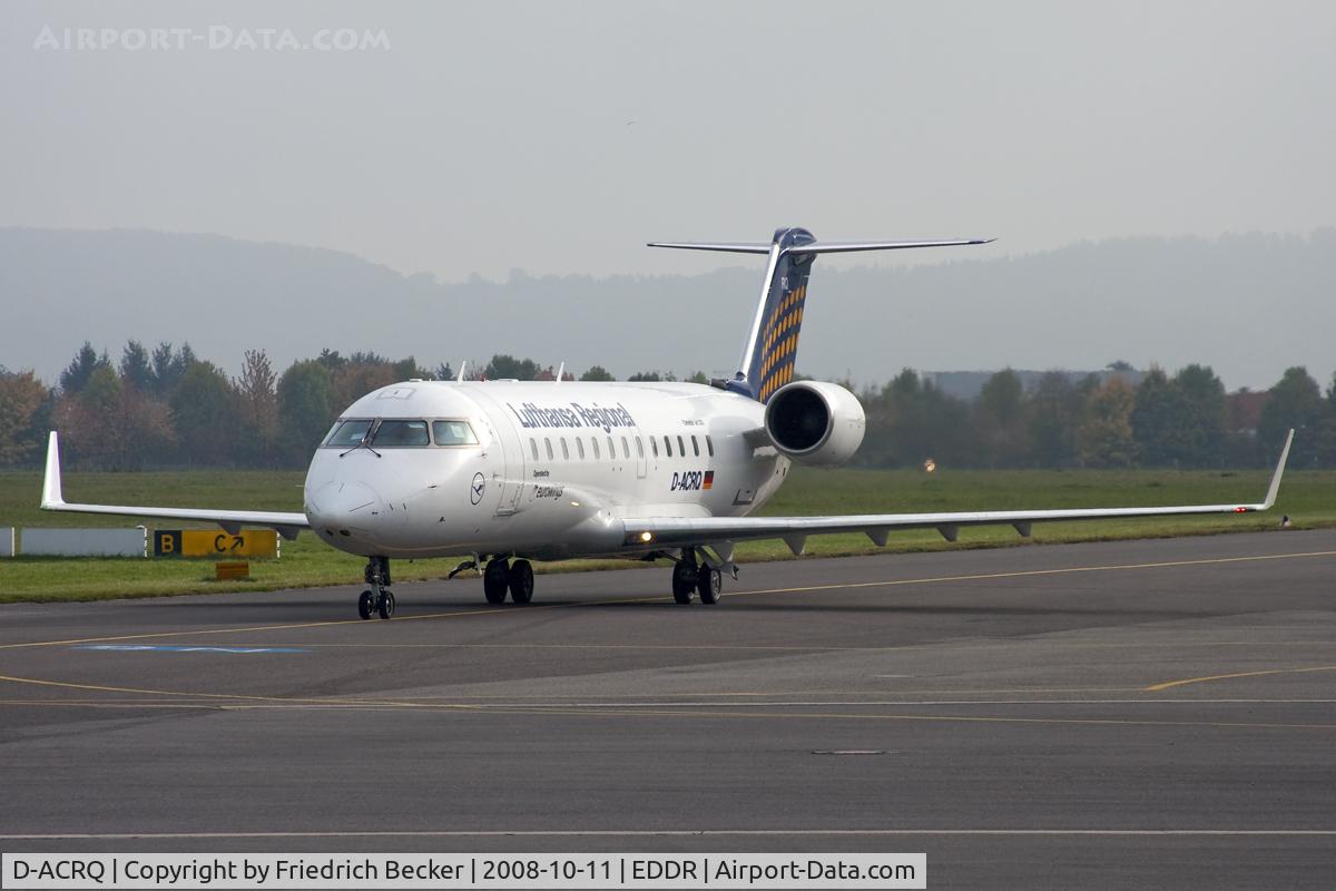D-ACRQ, 2002 Canadair CRJ-200LR (CL-600-2B19) C/N 7629, taxying to the satnd