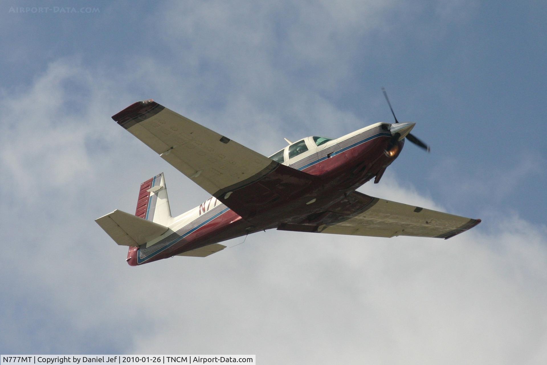 N777MT, 1980 Mooney M20K C/N 25-0418, N777MT departing TNCM