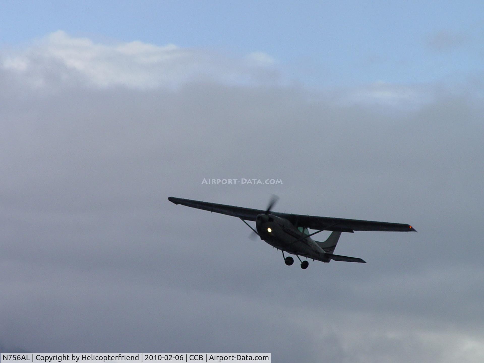 N756AL, 1979 Cessna TR182 Turbo Skylane RG C/N R18201023, Taking off in the rain, wheels coming up