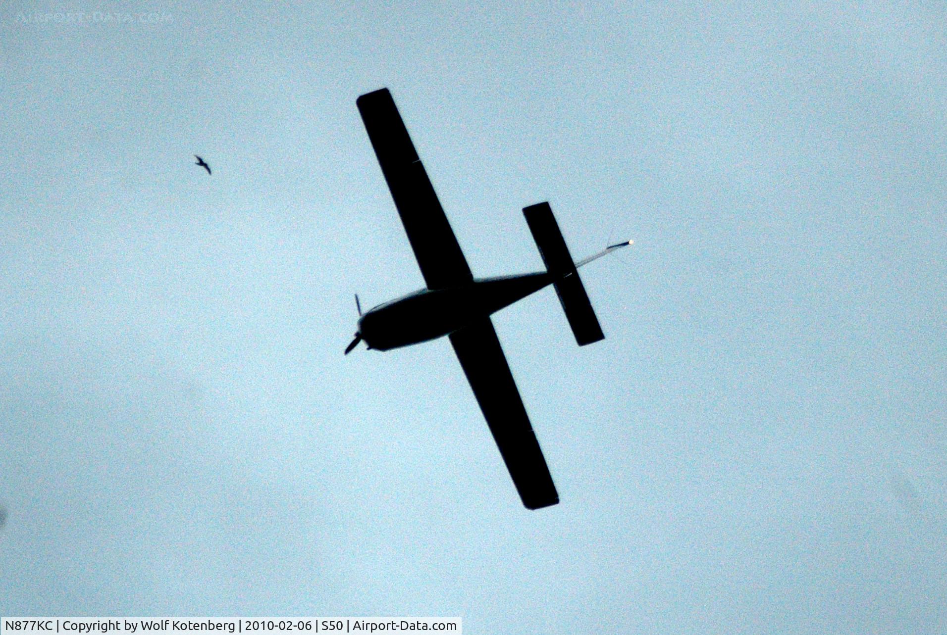 N877KC, Cirrus SR22 C/N 3432, landing at Auburn,from the east