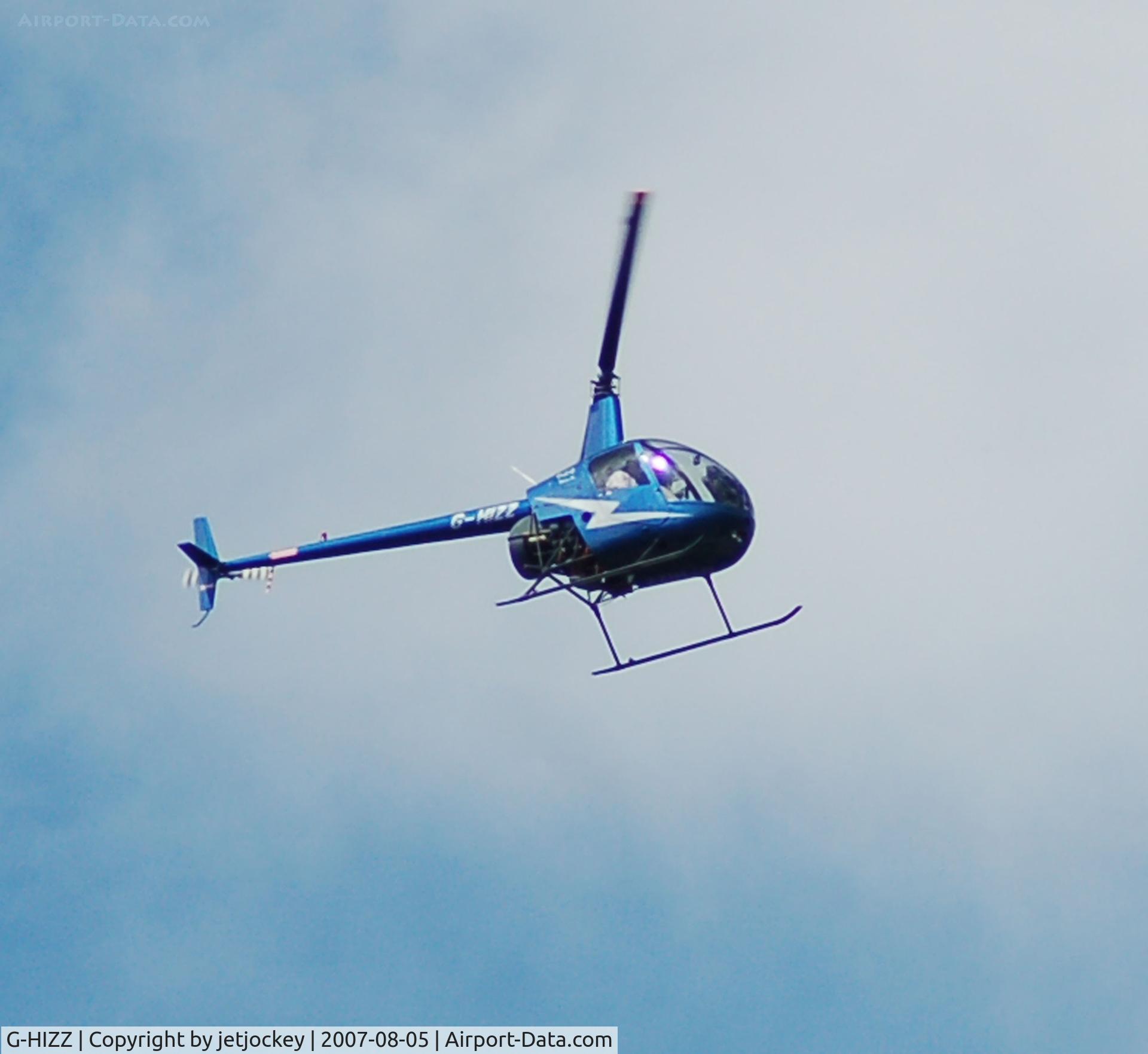 G-HIZZ, 1997 Robinson R22 Beta C/N 2677, Robinson R44  passing over the house