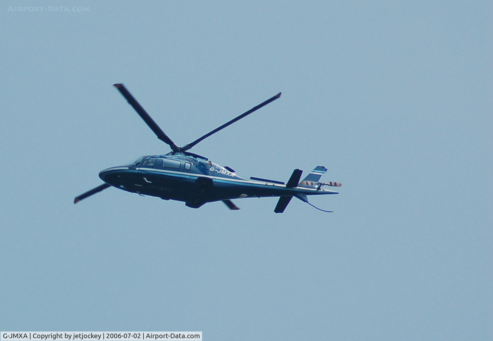 G-JMXA, 2002 Agusta A-109E Power C/N 11156, Passing over the house
