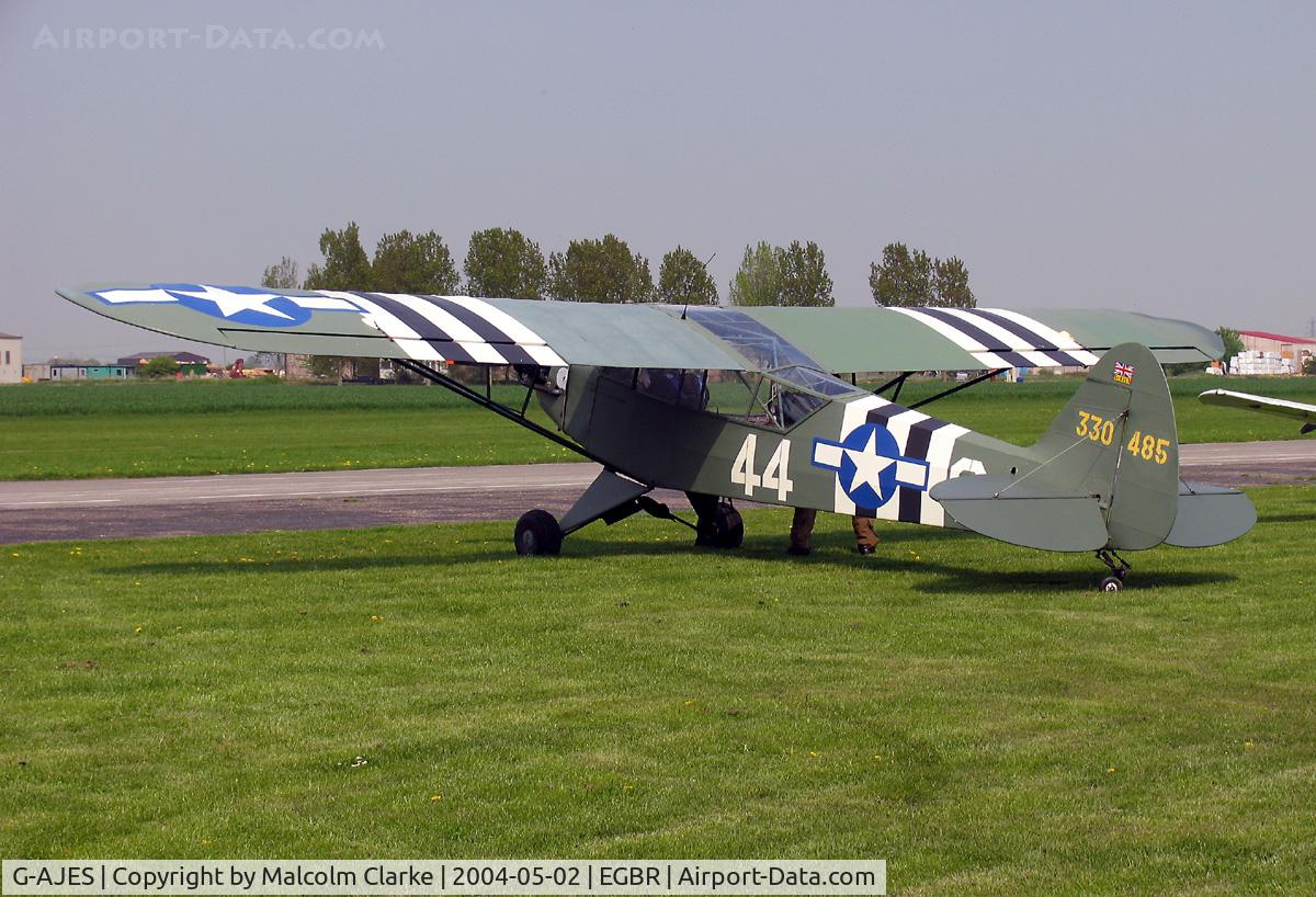 G-AJES, 1943 Piper L-4J Grasshopper (J3C-65D) C/N 11602, Piper L-4J Grasshopper (J-3C-65D). 43-30485 at Breighton's Spring Fly-in in 2004.