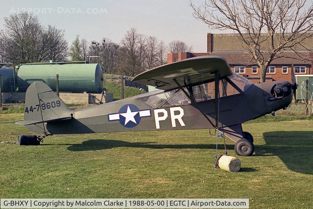 G-BHXY, 1944 Piper L-4H Grasshopper (J3C-65D) C/N 11905, Piper L-4H Grasshopper as USAF 44-79609. At Cranfield Airfield in 1988.