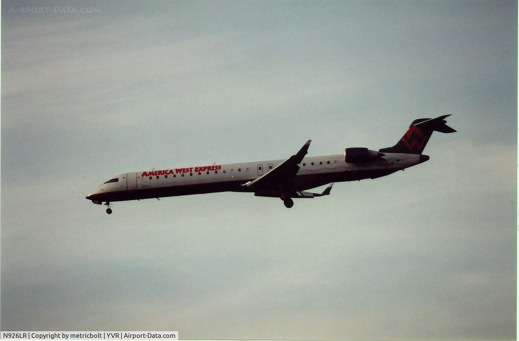 N926LR, 2004 Bombardier CRJ-900ER (CL-600-2D24) C/N 15026, Landing at YVR,May 2006