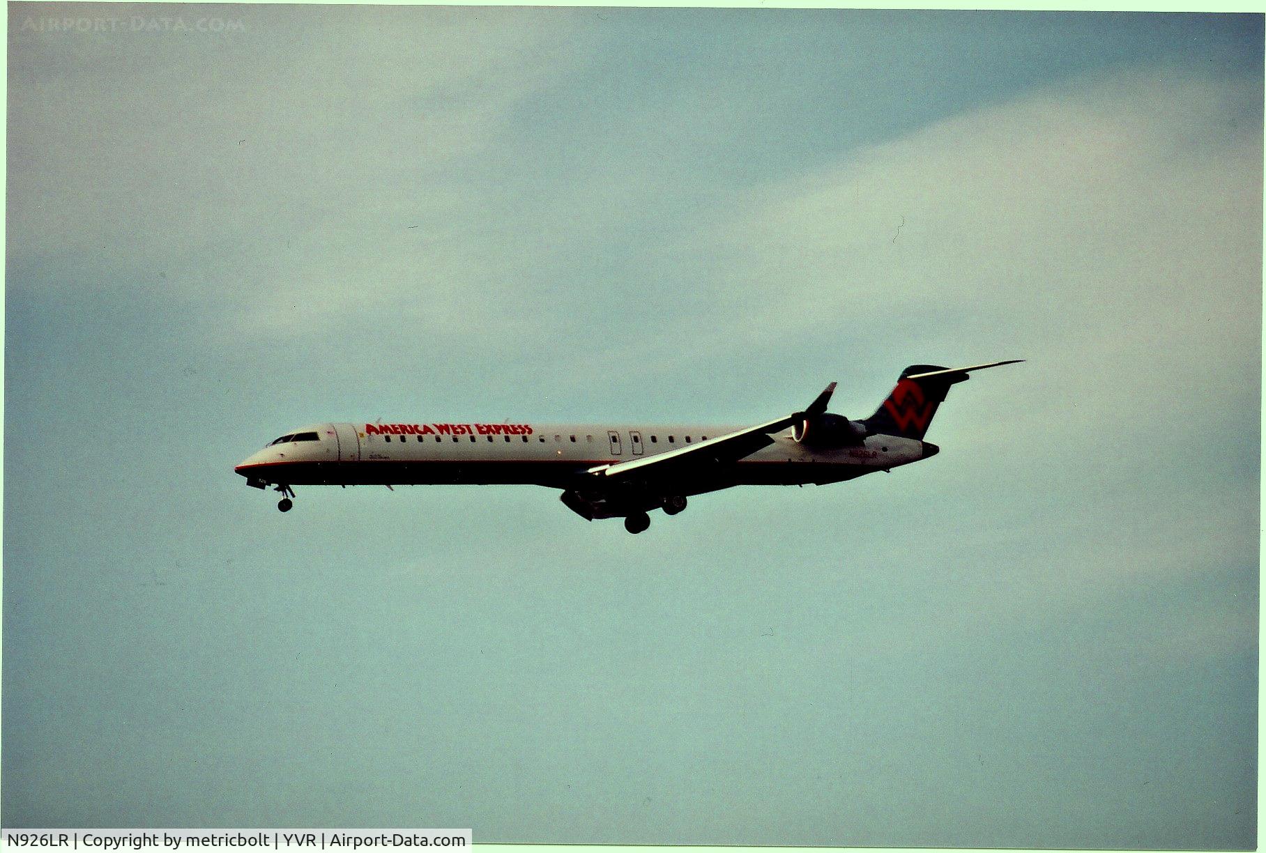 N926LR, 2004 Bombardier CRJ-900ER (CL-600-2D24) C/N 15026, Landing at YVR,May 2006
