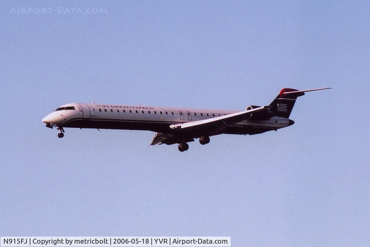 N915FJ, 2004 Bombardier CRJ900 (CL-600-2D24) C/N 15015, Landing at YVR