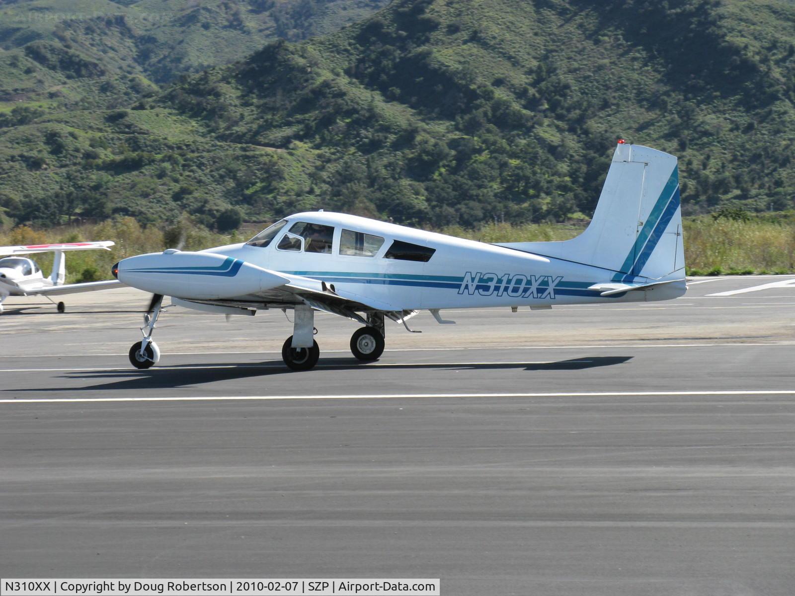 N310XX, 1956 Cessna 310 C/N 35411, 1956 Cessna 310, two Continental IO-470 260 Hp each, landing roll Rwy 04