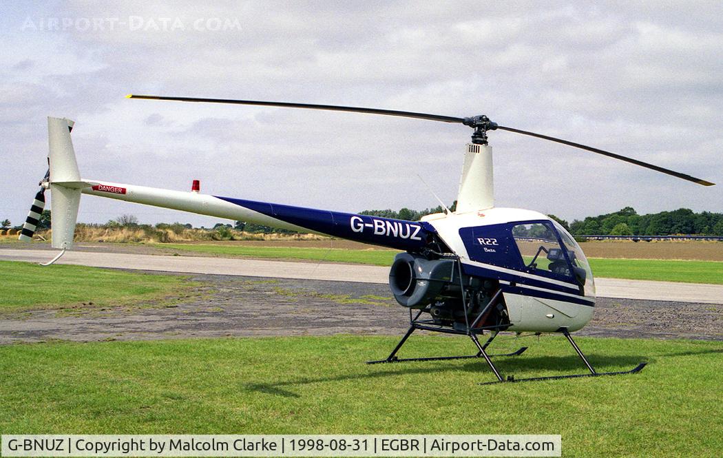 G-BNUZ, 1987 Robinson R22 Beta C/N 0680, Robinson R-22 Beta at Breighton Airfield in 1998. Destroyed in an accident at Biggin, North Yorkshire on December 2nd 2000.