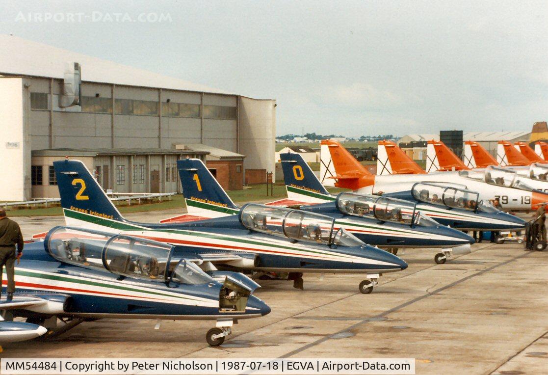 MM54484, Aermacchi MB-339A C/N 6681/076/AD013, MB339A number 2 of the Frecce Tricolori display team on the flight-line at the 1987 Intnl Air Tattoo at RAF Fairford.