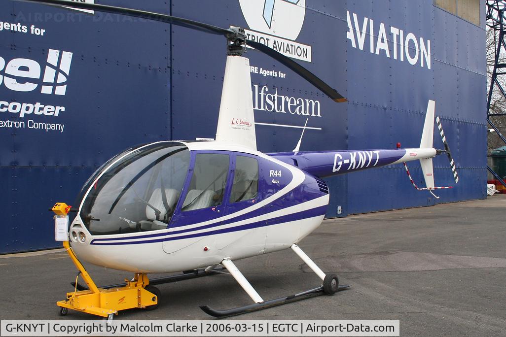 G-KNYT, 2000 Robinson R44 Astro C/N 0723, Robinson R-44 Astro outside the Patriot Aviation hangar at Cranfield Airport in 2006.