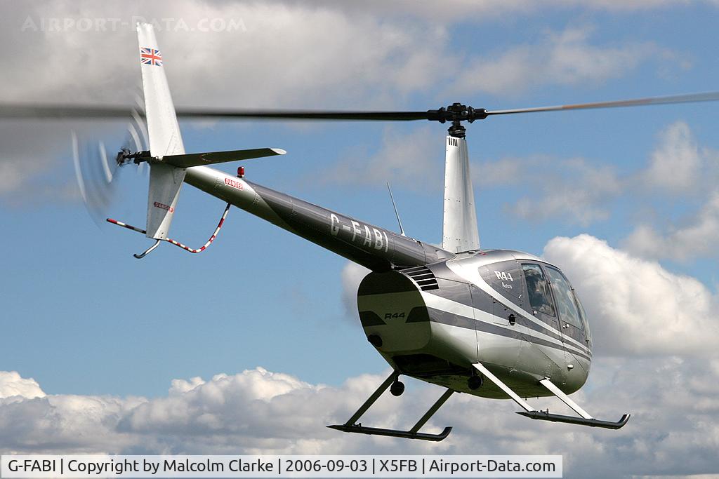 G-FABI, 1997 Robinson R44 Astro C/N 0325, Robinson R-44 Astro at Fishburn Airfield in 2006.