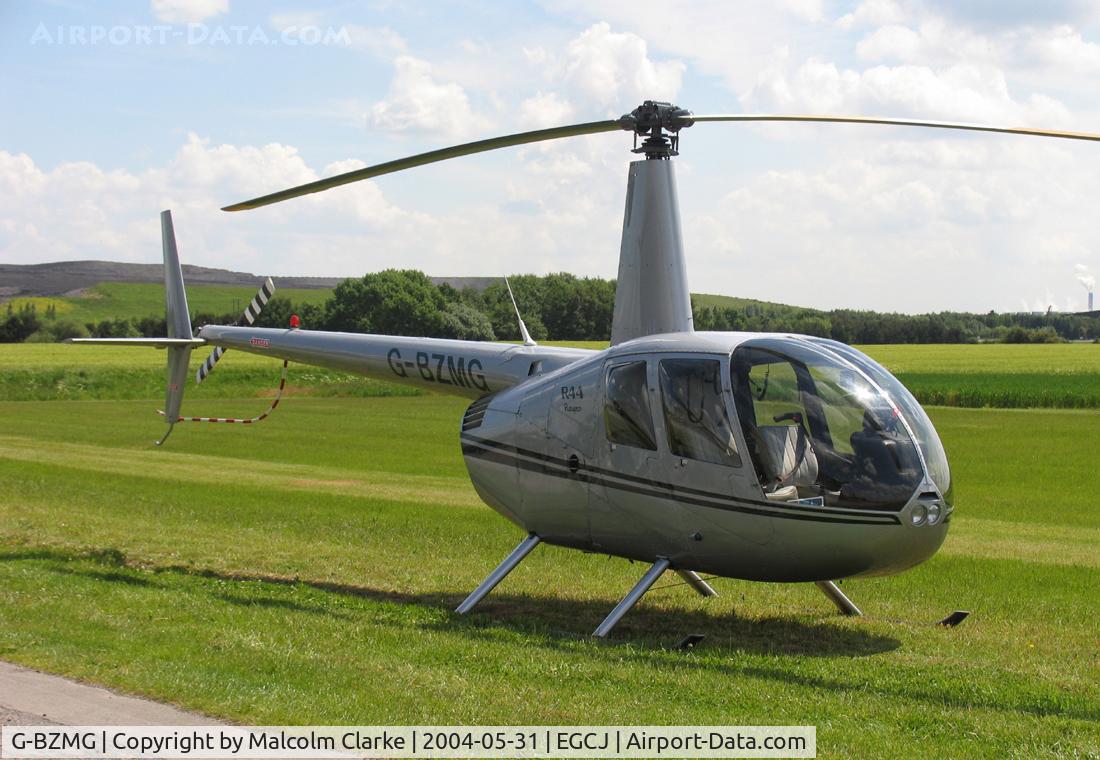 G-BZMG, 2000 Robinson R44 Raven C/N 0815, Robinson R-44 Raven at Sherburn-in-Elmet Airfield, UK in 2004.