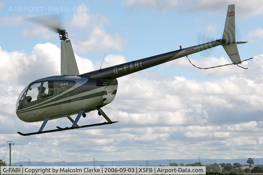 G-FABI, 1997 Robinson R44 Astro C/N 0325, Robinson R-44 Astro at Fishburn Airfield, UK in 2006.