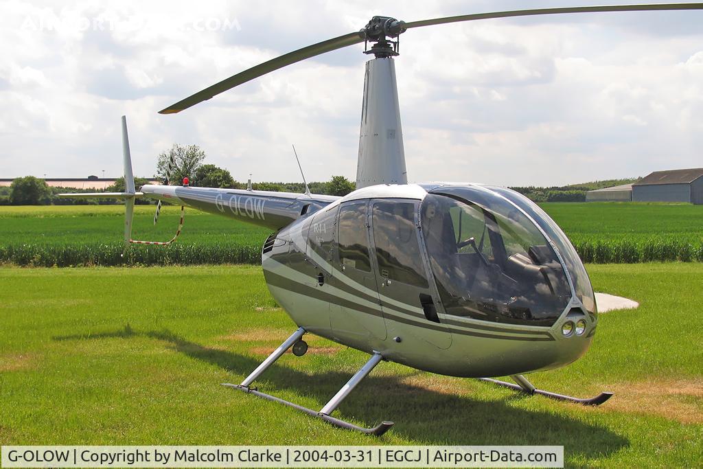 G-OLOW, 1994 Robinson R44 Astro C/N 0100, Robinson R-44 Astro at Sherburn-in-Elmet Airfield, UK in 2004.