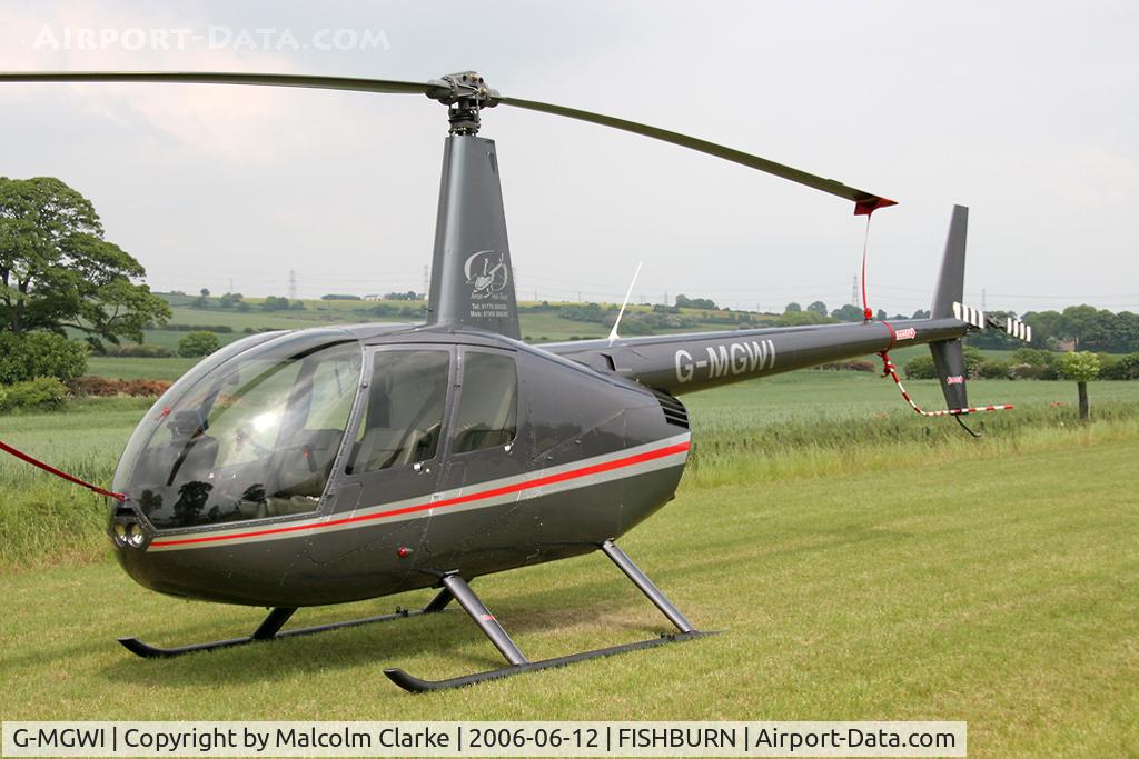 G-MGWI, 2000 Robinson R44 Astro C/N 0663, Robinson R-44 Astro at Fishurn Airfield, UK in 2006.