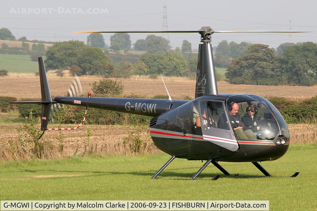 G-MGWI, 2000 Robinson R44 Astro C/N 0663, Robinson R-44 Astro at Fishburn Airfield in 2006.
