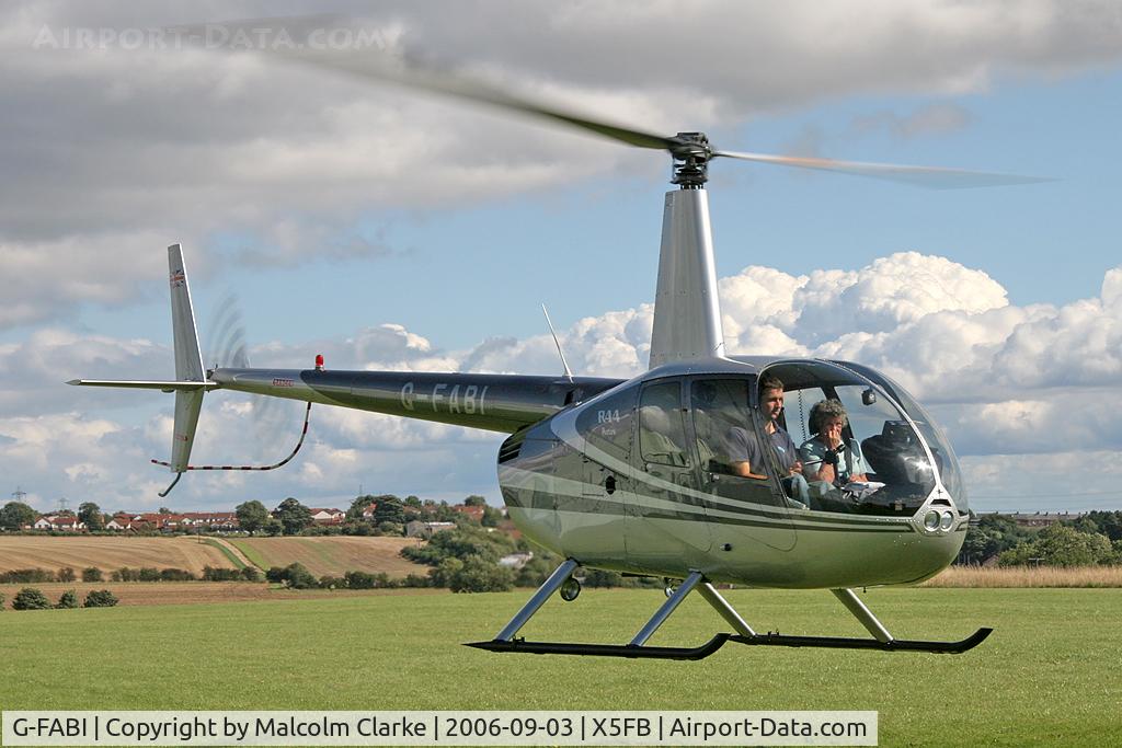 G-FABI, 1997 Robinson R44 Astro C/N 0325, Robinson R-44 Astro at Fishburn Airfield in 2006.