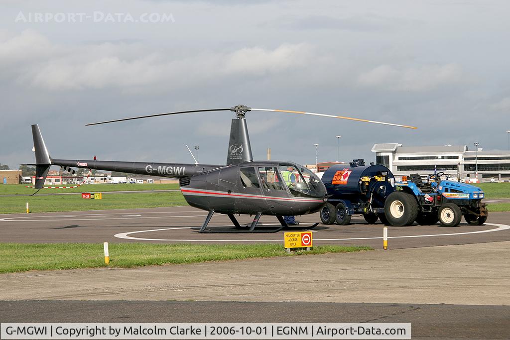 G-MGWI, 2000 Robinson R44 Astro C/N 0663, Robinson R-44 Astro refuelling at Leeds Bradford Airport in 2006