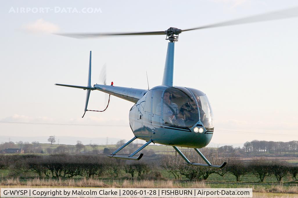 G-WYSP, 1999 Robinson R44 Astro C/N 0657, Robinson R-44 Astro at Fishburn Airfield in 2006.
