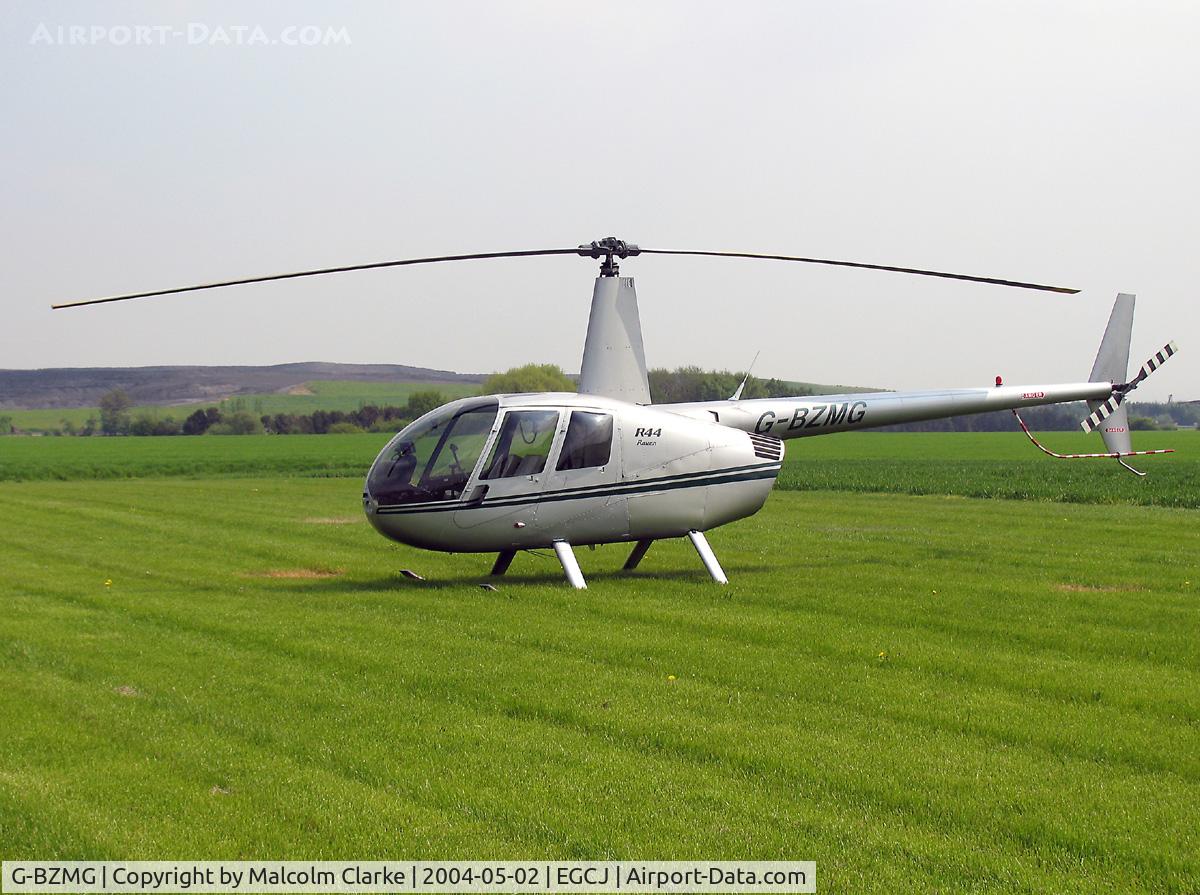 G-BZMG, 2000 Robinson R44 Raven C/N 0815, Robinson R-44 Raven at Sherburn-in-Elmet Airfield, UK in 2004.