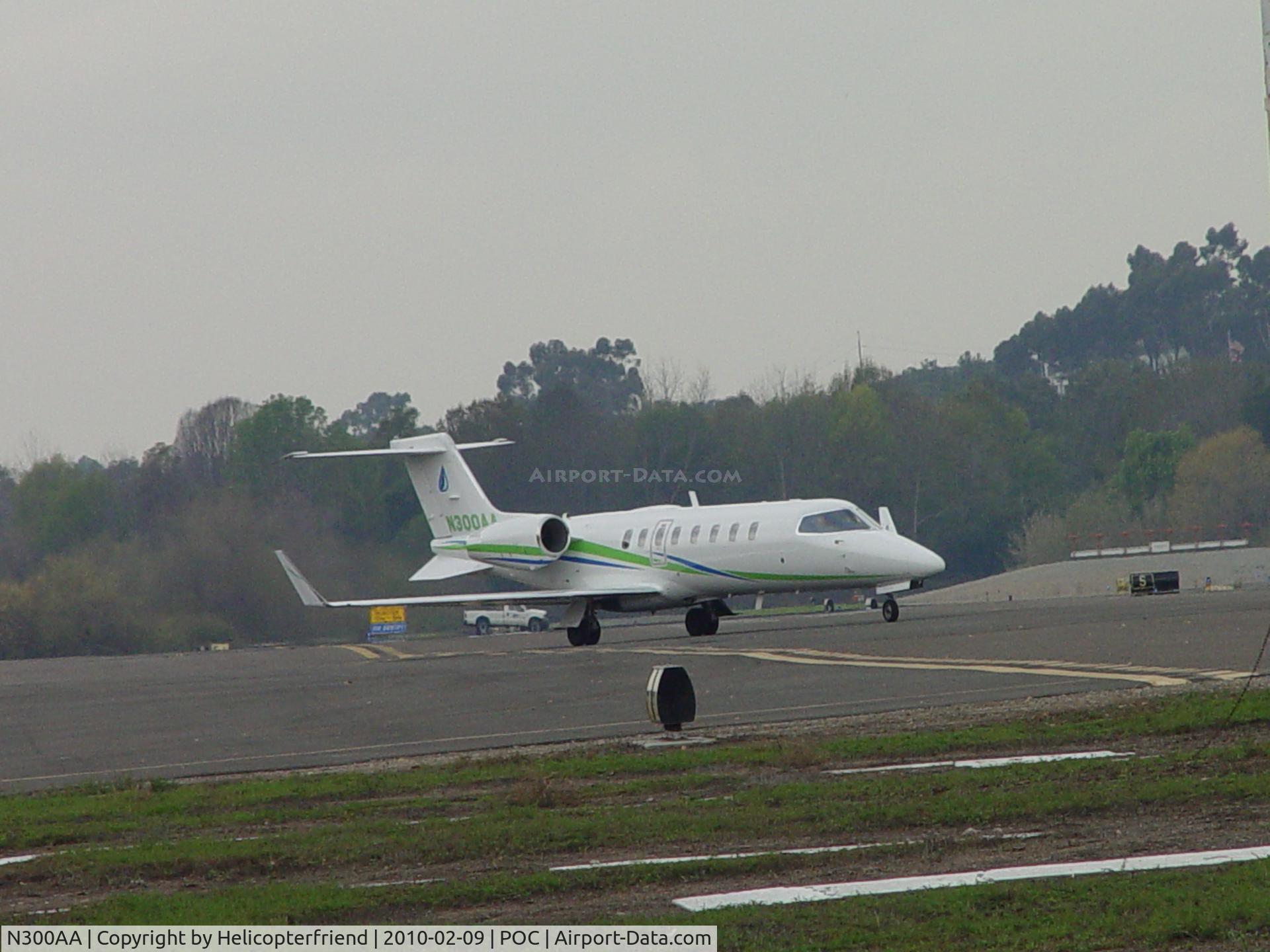 N300AA, 2005 Learjet 45 C/N 45-285, Entering taxiway headed to runway 26L