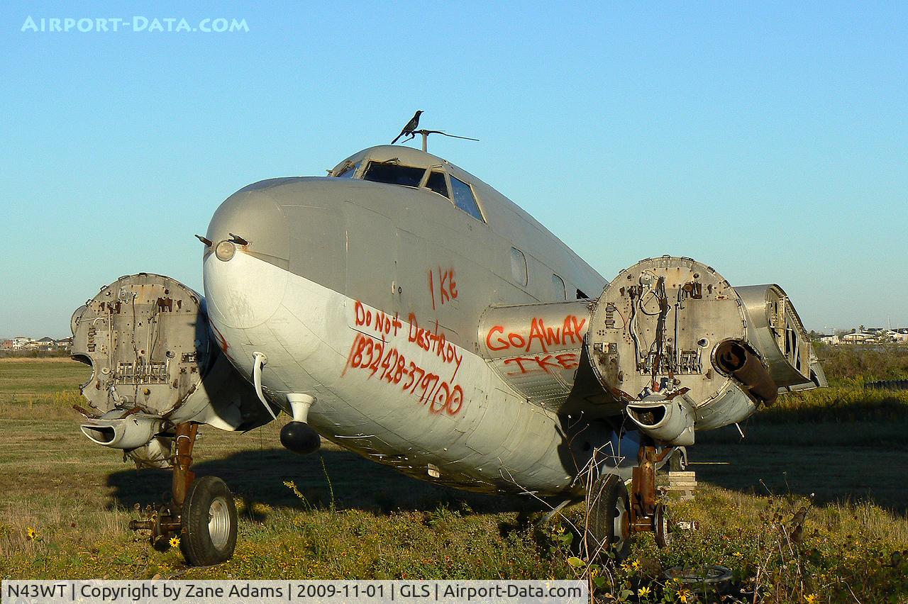 N43WT, 1943 Lockheed 18-56 Lodestar Lodestar C/N 18-2565, At Galveston Scholes Field - spray painted to indicate it is not to be scrapped in the afternmath of Hurricane Ike in 2008. 