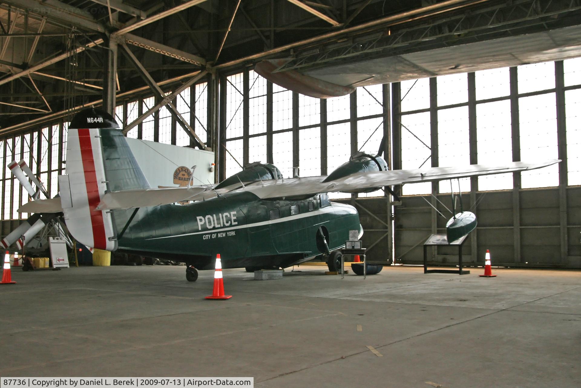 87736, 1945 Grumman G-21A Goose C/N B-130, The Historic Aircraft Restoration Project have repainted this aircraft in the colors of the NYPD, which still flies from this base, though using helicopters.
