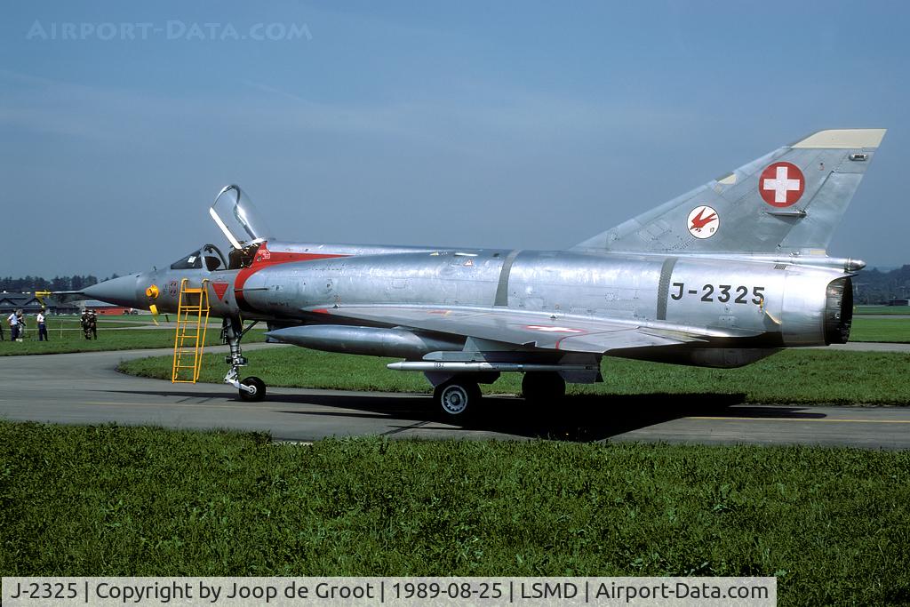 J-2325, Dassault (F+W Emmen) Mirage IIIS C/N 17-26-123/1015, This was one of the last Mirages in the original bare metal colors. After the canards had been fitted it was resprayed to the new two tone grey.