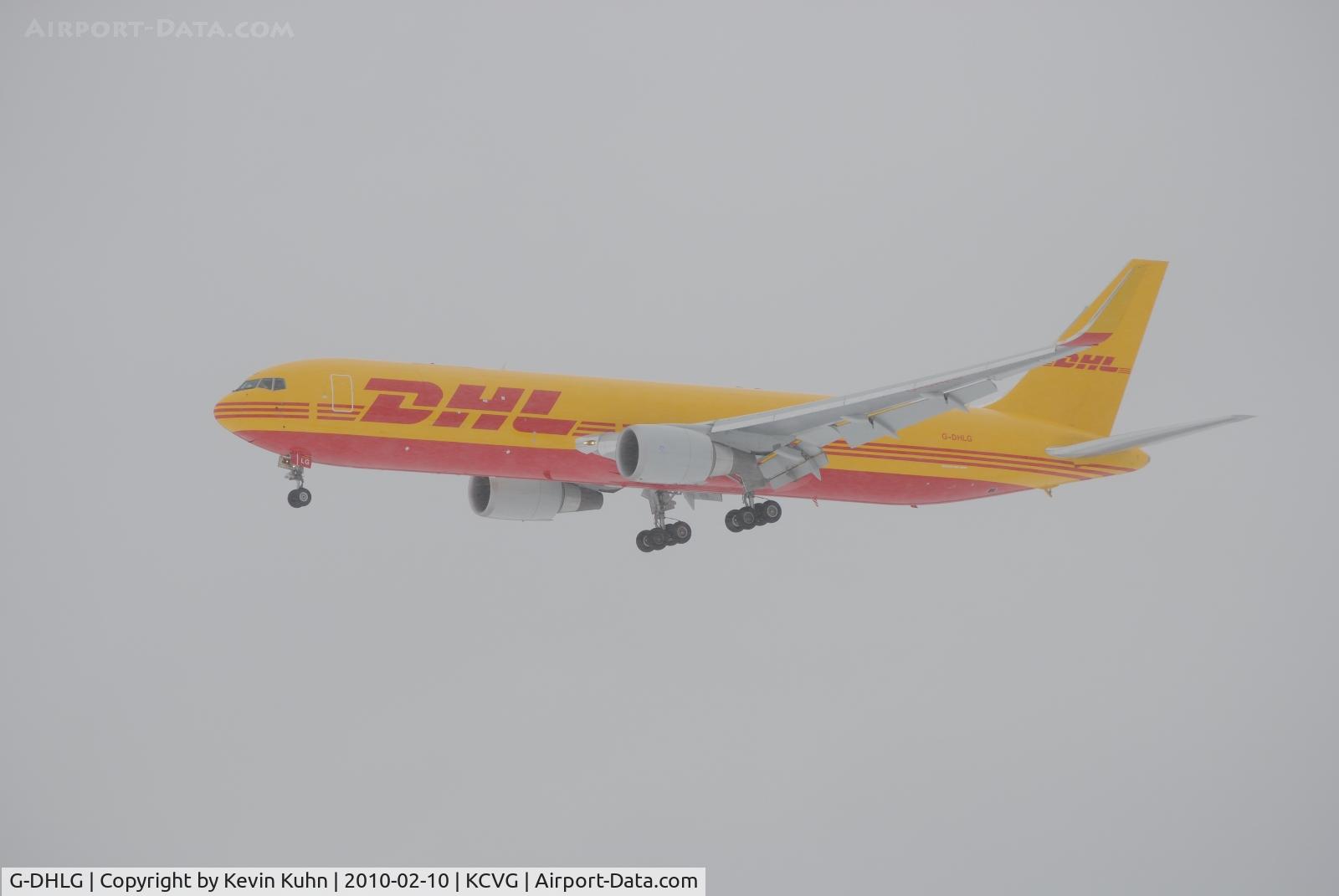 G-DHLG, 2009 Boeing 767-3JHF C/N 37807, Lima Golf on final approach for Rwy 27 amidst the blowing snow