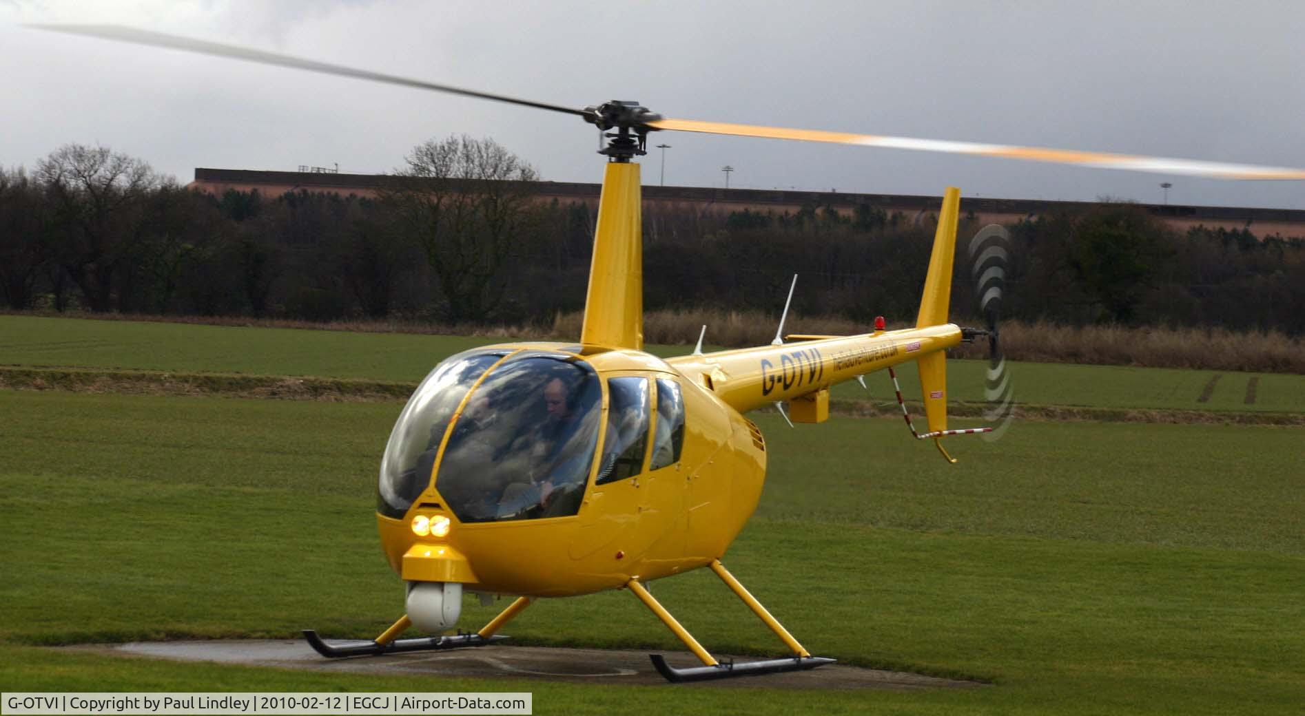 G-OTVI, 2005 Robinson R44 Raven II C/N 10833, caught shutting down