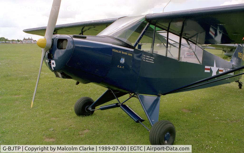 G-BJTP, 1951 Piper L-18C Super Cub (PA-18-95) C/N 18-999, Piper L-18C Super Cub painted in fake US Marines markings. Crannfield Airfield July 1989.