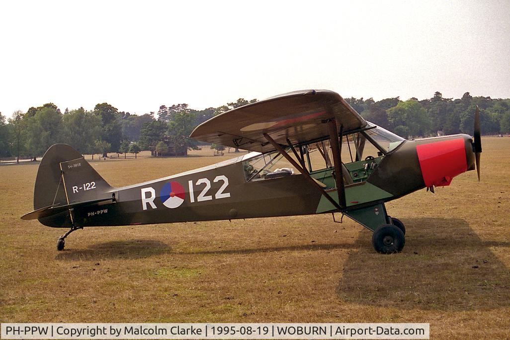 PH-PPW, Piper PA-18-135 Super Cub C/N 18-3812, Piper PA-18-135 Super Cub as R122 of the Netherlands Air Force at the De Havilland Tiger Moth Rally held in the grounds of Woburn Abbey in 1995.