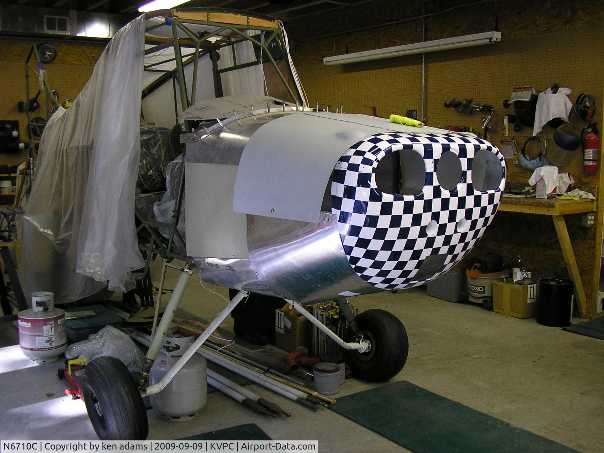 N6710C, Aeronca 7CCM C/N 7CCM-69, aircraft in rebuild state, new nose bowl colors