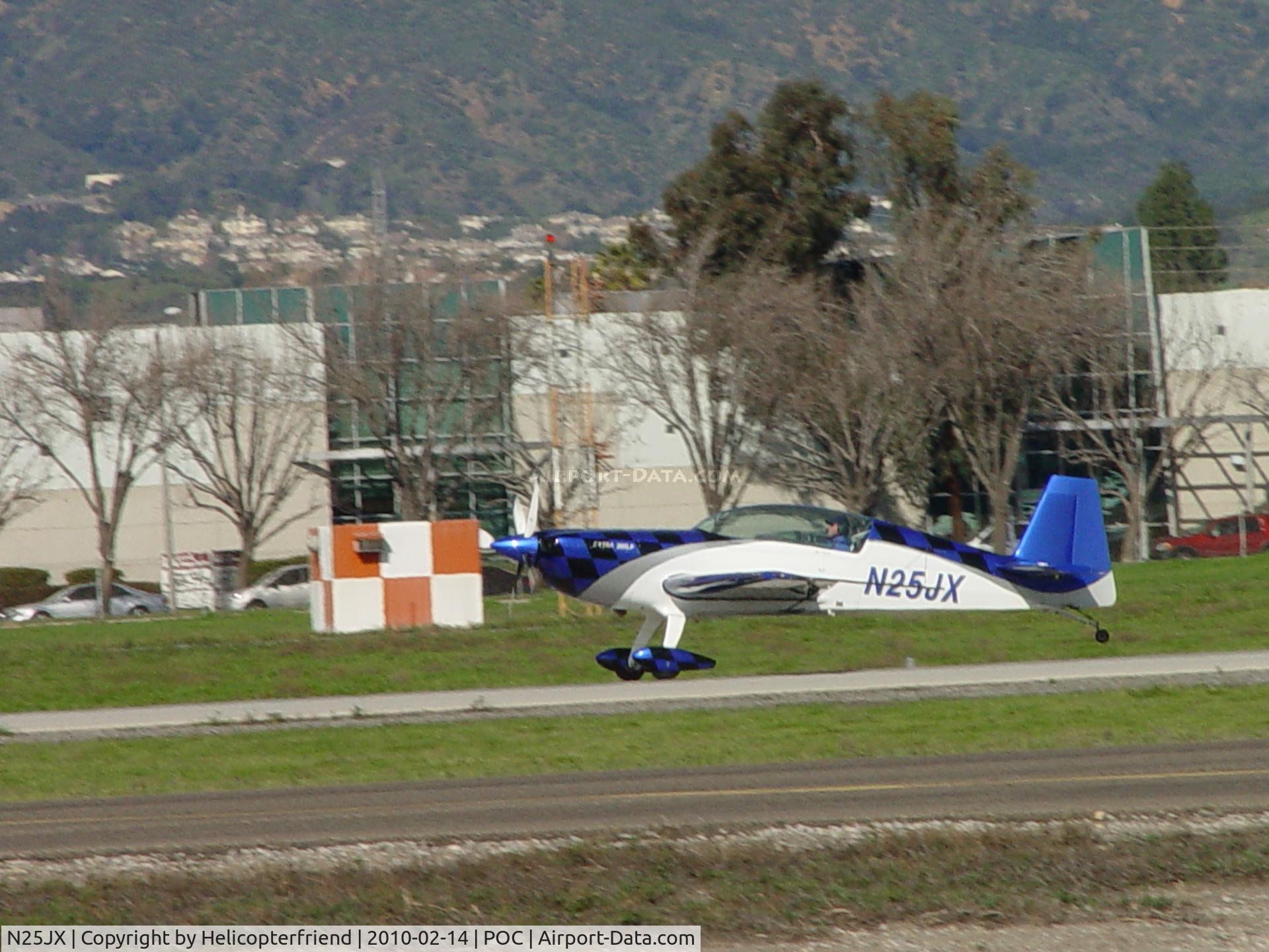 N25JX, 2007 Extra EA 300/L C/N 1259, Touching down runway 26L