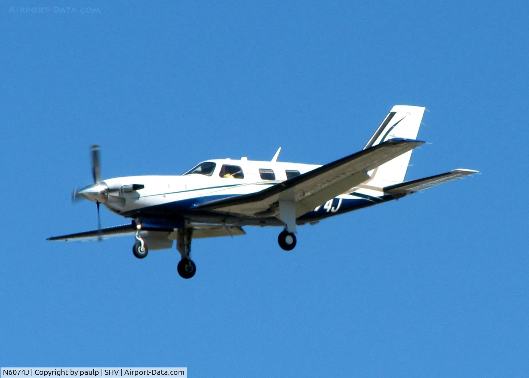 N6074J, 2009 Piper PA-46-500TP C/N 4697397, Landing on 23 at Shreveport Regional.