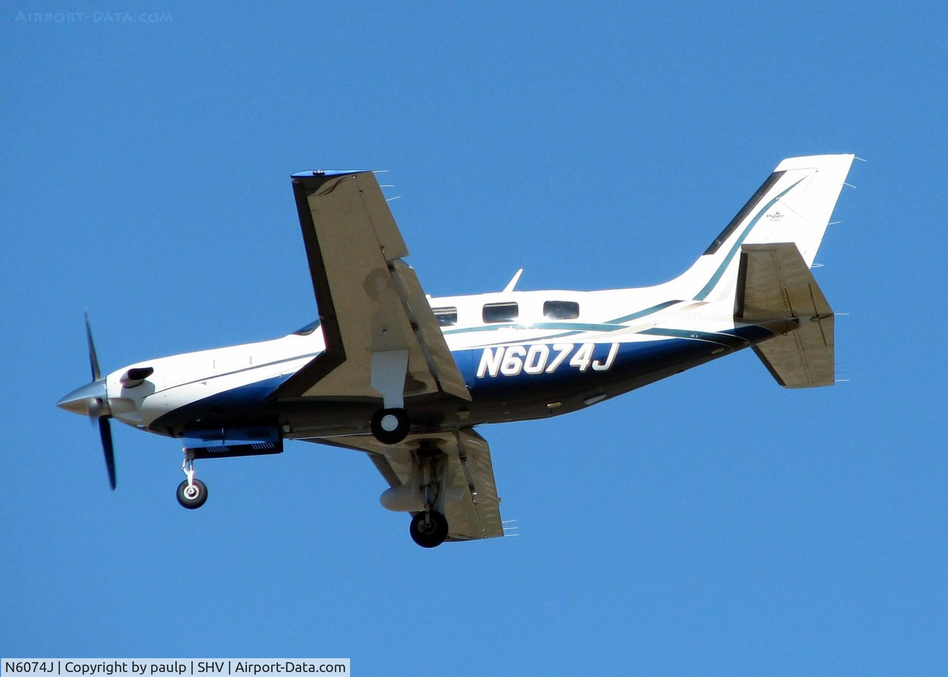 N6074J, 2009 Piper PA-46-500TP C/N 4697397, Landing on 23 at Shreveport Regional.