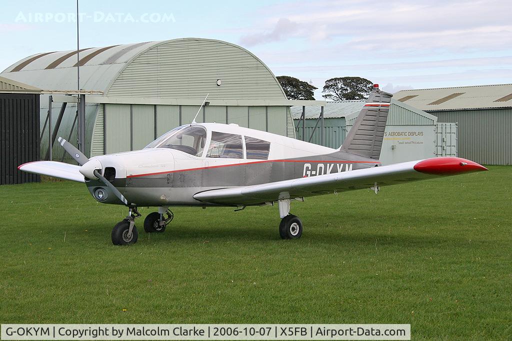 G-OKYM, 1967 Piper PA-28-140 Cherokee C/N 28-23303, Piper PA-28-140 Cherokee 140-4 at Fishburn Airfield in 2006.