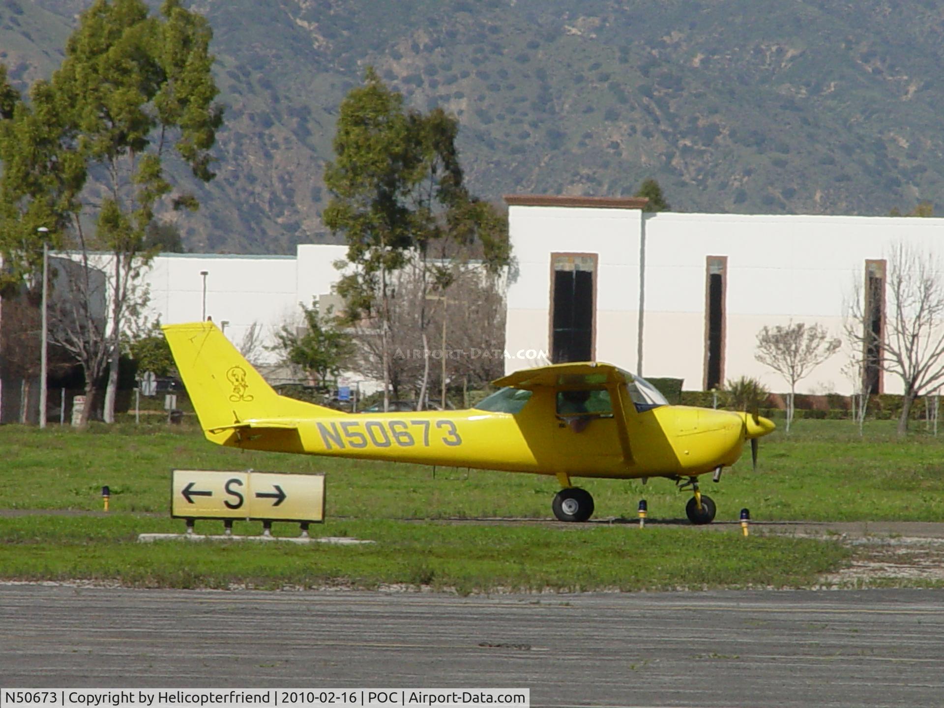 N50673, 1968 Cessna 150J C/N 15069477, Tweety Bird taxiing to runway 26L