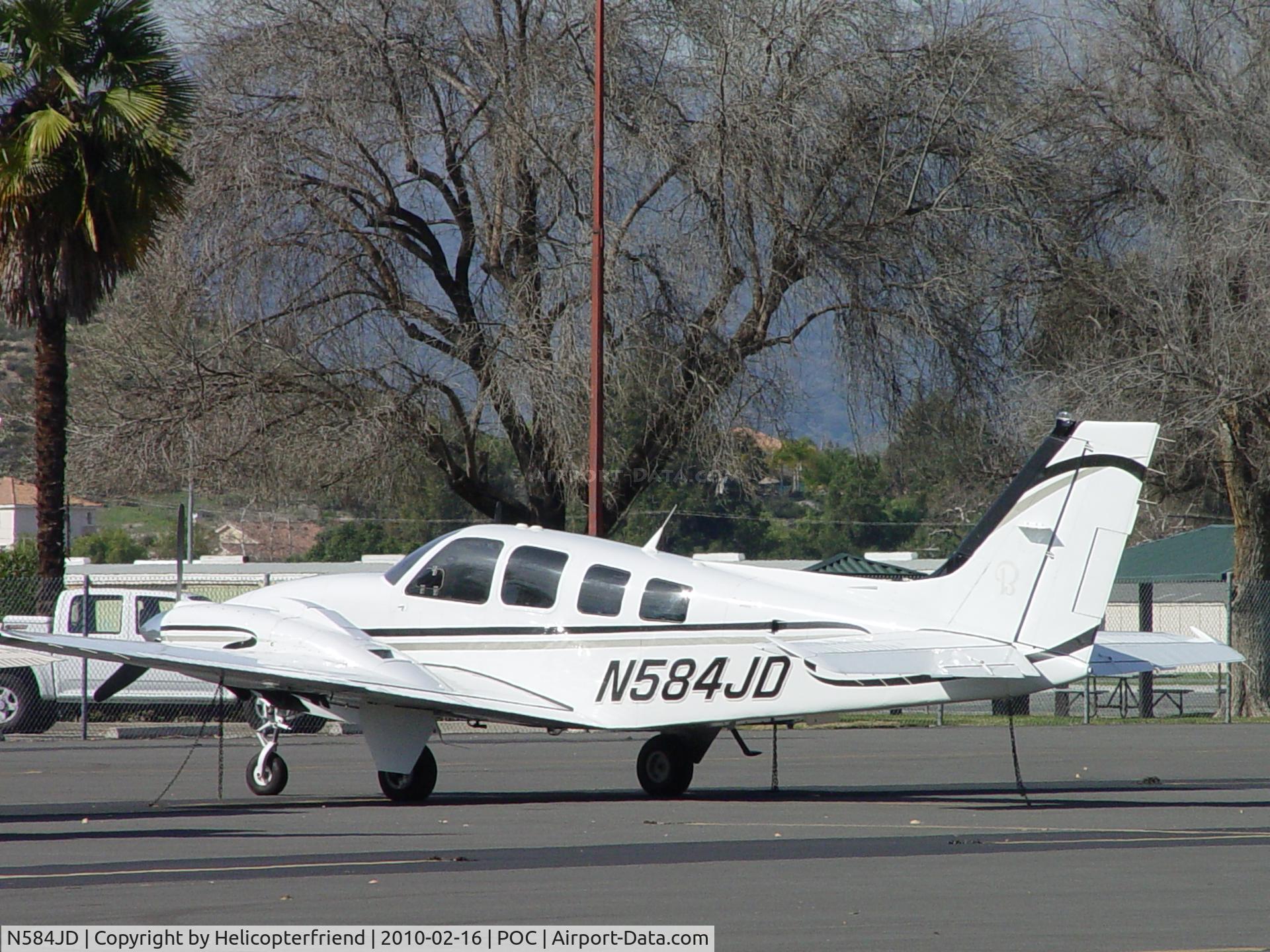 N584JD, Raytheon Aircraft Company G58 Baron C/N TH-2135, Parked and tied down in transient parking