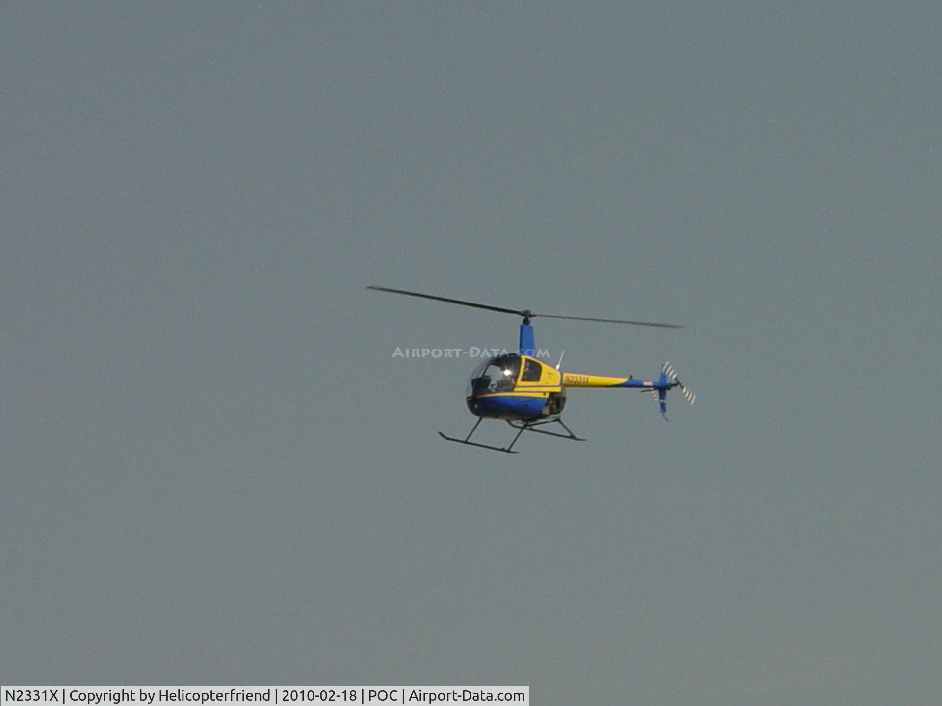N2331X, 1992 Robinson R22 BETA C/N 2145, On final over runway 26L